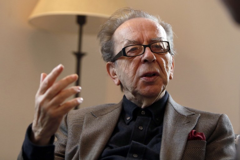 TO GO WITH STORY BY LAURENT LOZANO Albanian novelist Ismail Kadare gestures during an interview with AFP on February 8, 2015 in Jerusalem. Born in 1936 in the Albanian mountain town of Girokaster, Kadare has won a number of prestigious prizes including the first international Man Booker Prize in 2005. AFP PHOTO/ GALI TIBBON