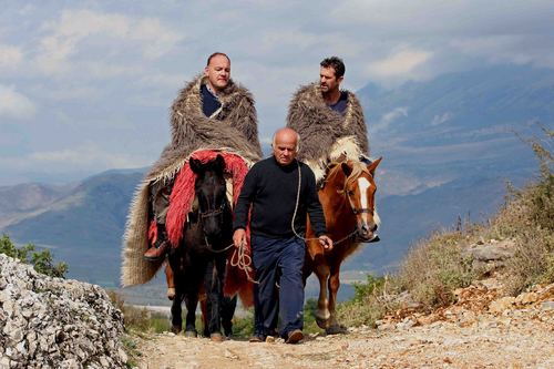 Picture by Philip Hollis for Channel 4     4-10-08 Rupert Everett on location in Gjirokaster in Southern Albania filming the life of Lord Byron.  Riding with Albanian Byron expert Auron Tare